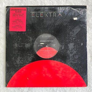 Grandmaster Flash - Girls Love The Way He Spins + Larrys Dance Theme Vinyl